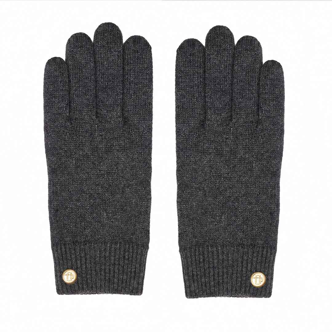 Pair of dark gray gloves with gold buttons on a white background