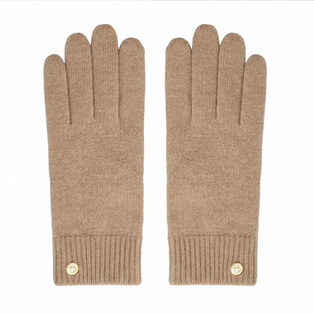 Pair of beige gloves with gold buttons on a white background