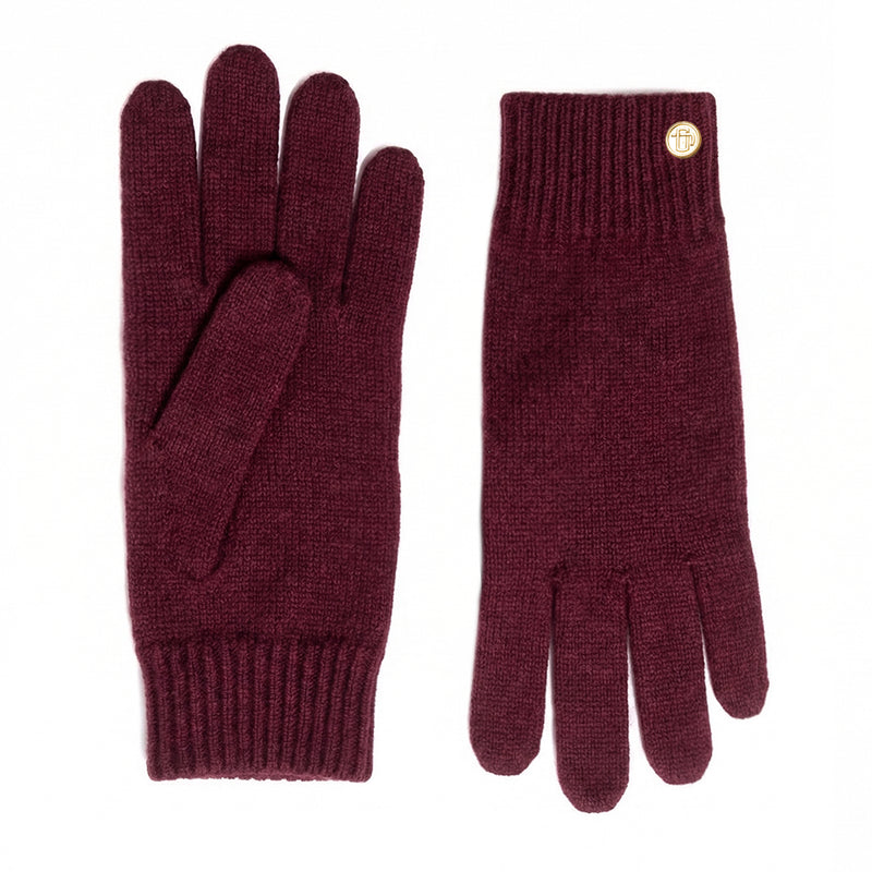 Pair of maroon gloves with a gold button on a white background