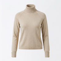 Beige turtleneck sweater on a light gray background