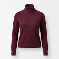Maroon turtleneck sweater on a white background