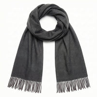 Gray scarf with fringes on a white background