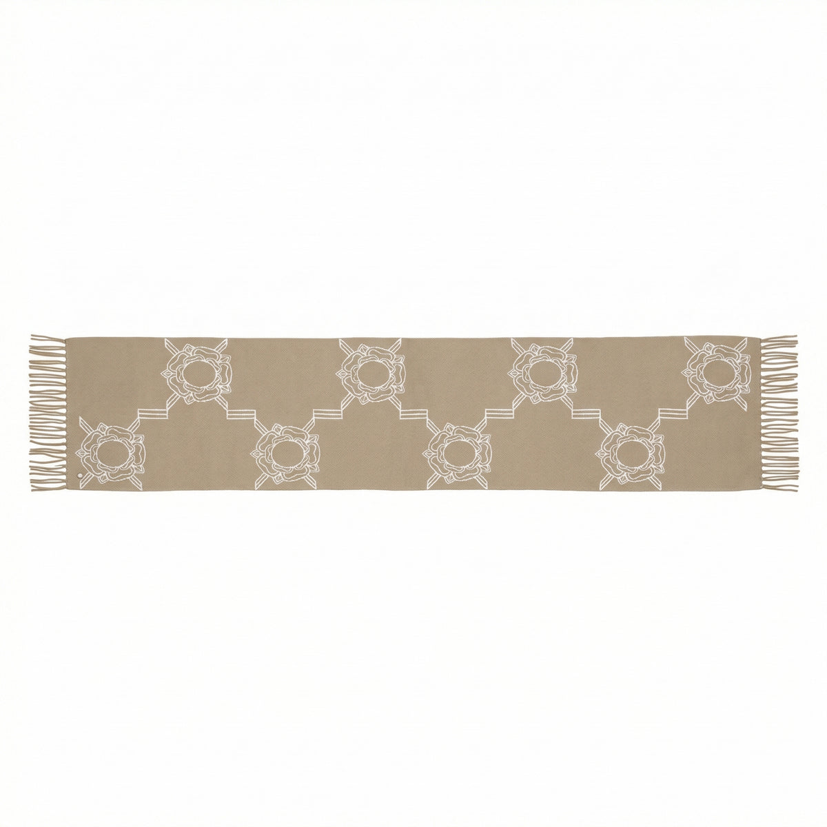 Beige table runner with white geometric pattern on a white background